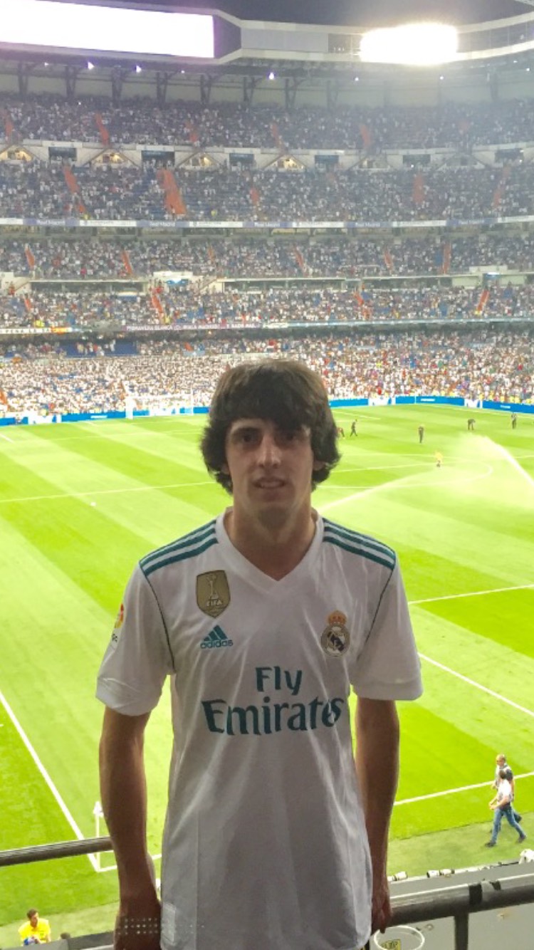Andrew proudly sporting his Real Madrid jersey in Spain