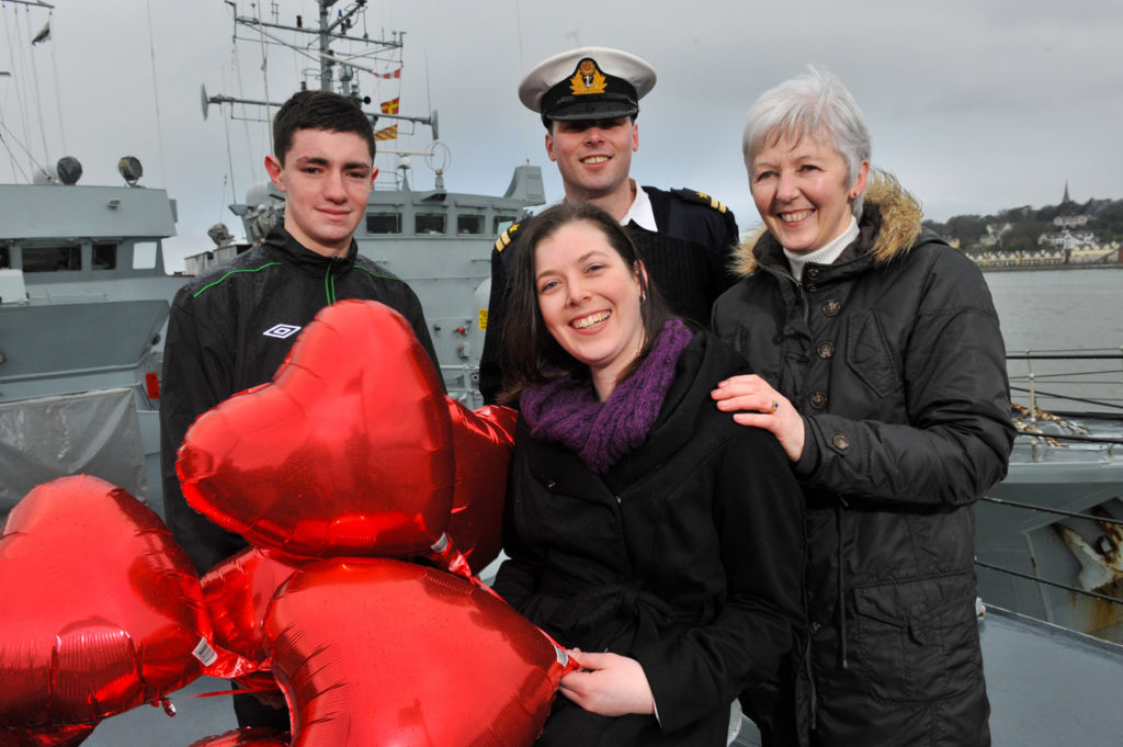 REPRO FREE Cork city soccer player Brian Lenihan, Lt Gary Jordan (Sarah's brother), Sarah Jordan, Cork Heart Recipient and her mother Mary Jordan pictured on the deck of the Irish Naval vessel the LE Aoife at Have a Heart Fundraiser 2013 - In Aid of the Mater Heart & Lung Appeal, Mater Hospital following Sarah's successful Heart Transplant. The event will take place at the Irish Naval Base, Haulbowline, Cork on Saturday March 2, 2013. Further details on www.facebook.com/materfoundation. Pic Daragh Mc Sweeney/Provision Contact: Arlene Hogan Communications & Fundraising Assistant The Mater Foundation 53-54 Eccles Street Dublin 7 Direct Line: 01 854 5289 Main Line: 01 830 3482