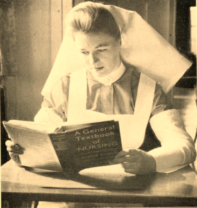 Historical Picture of a Mater Hospital Nurse reading a textbook